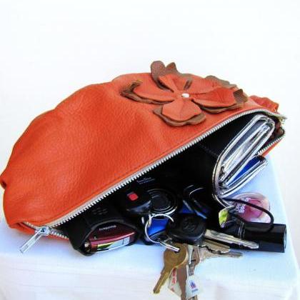 Medium Sized Orange Leather Clutch ..