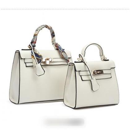 Leather Handbag With Padlock Fastening Detail And..