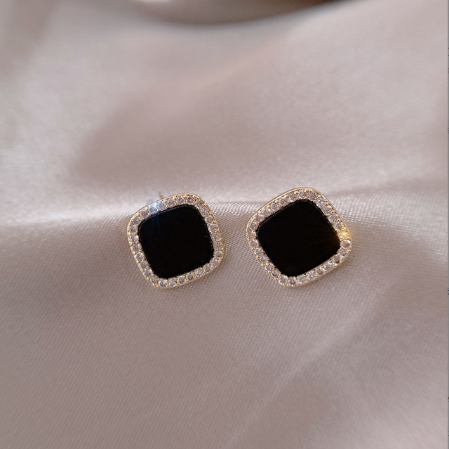 Sleek black geometric button earrings